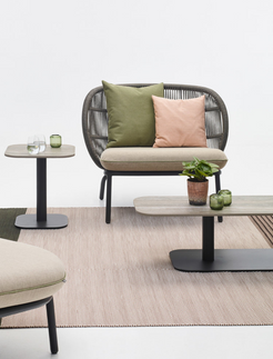 Kodo Lounge Chair in setting with tables and rug